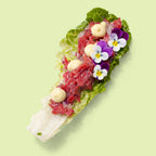 Beef tartare with English mustard in crisp lettuce cups for canapé catering Sydney CBD