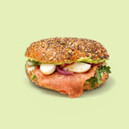 Smoked salmon bagel with herb ricotta, rocket and capers for office catering Sydney CBD