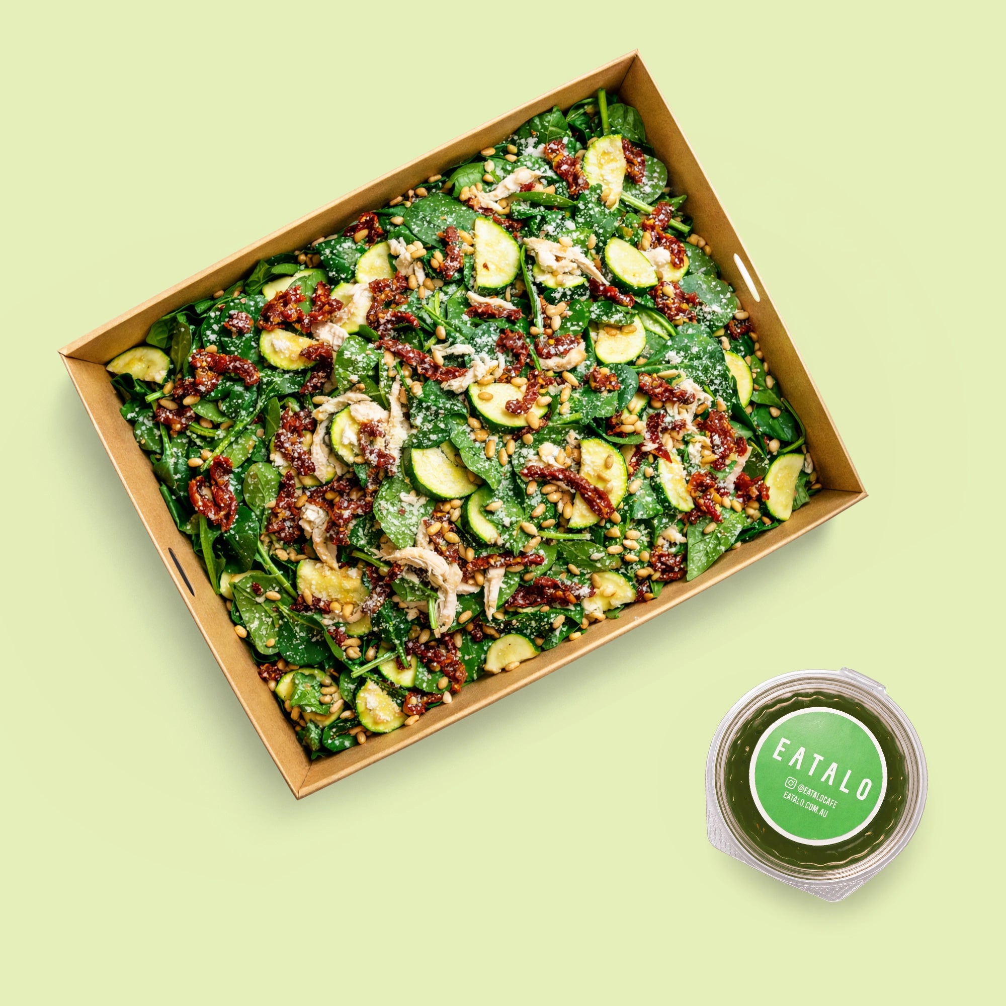Chicken zucchini salad sharing tray with pine nuts, parmesan and basil pesto for catering Sydney CBD
