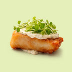 Crispy battered barramundi bite with tartar sauce and micro watercress for canapé catering Sydney CBD