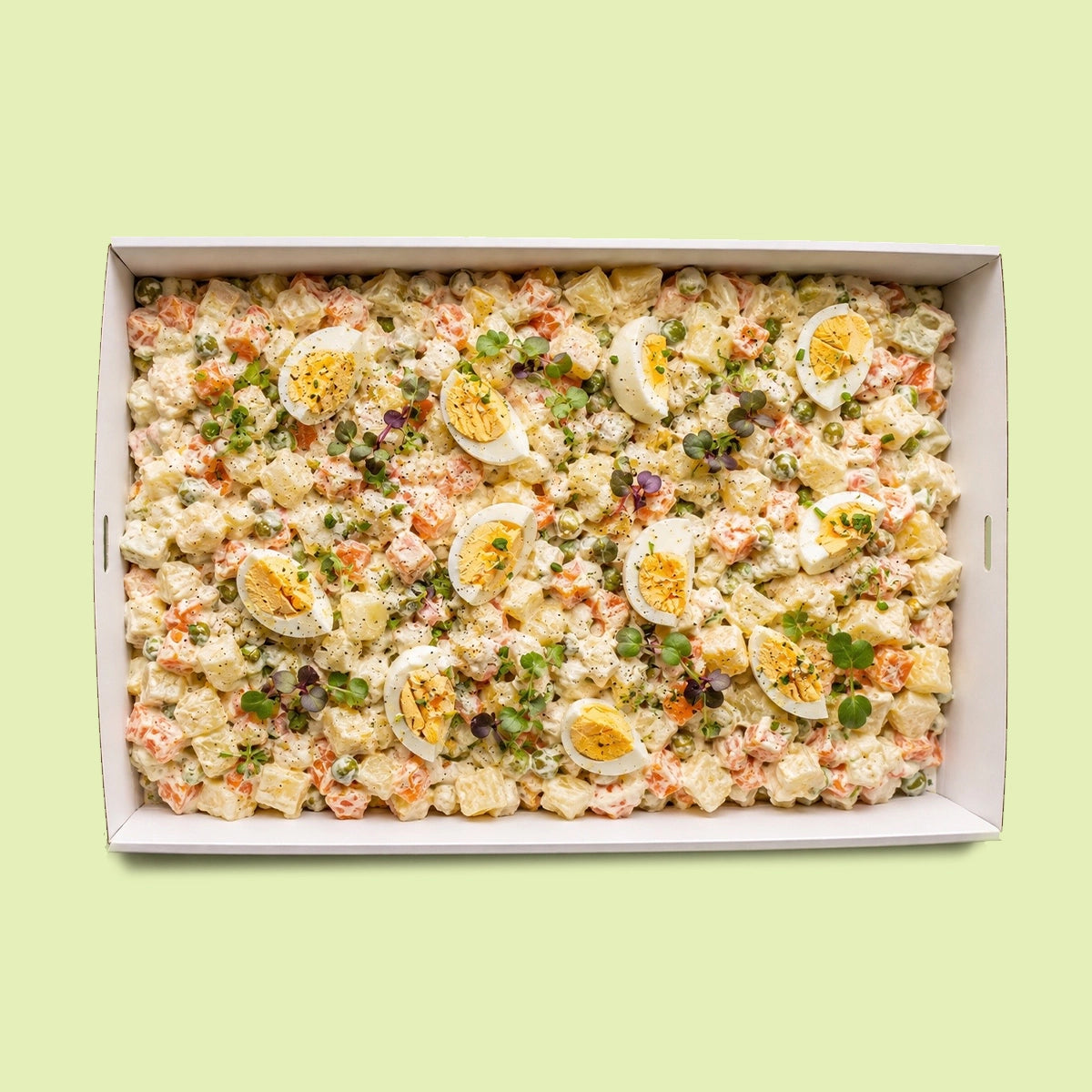 Catering Box of Italian Russian salad (Insalata Russa) with diced potato, carrot, boiled eggs and peas in a creamy dairy free mayonnaise.