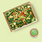 Grilled halloumi salad sharing tray with avocado, kale and cherry tomatoes for catering Sydney CBD
