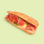 Prosciutto egg salad roll with basil and baby spinach on sourdough for catering Sydney CBD