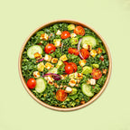 Grilled halloumi salad bowl with avocado, kale and cherry tomatoes for office lunch Sydney CBD
