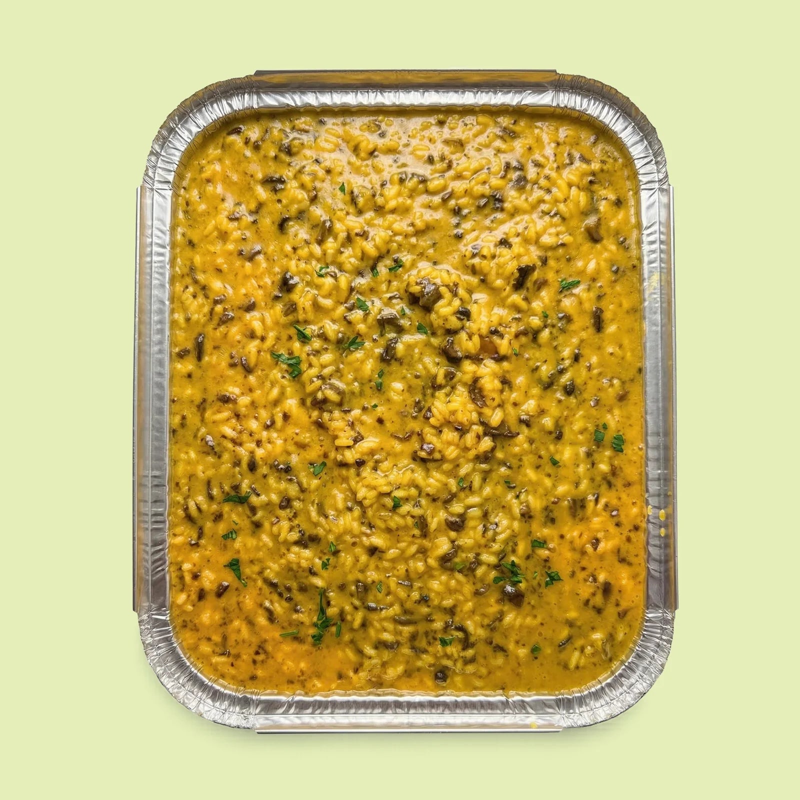 Close-up of gluten-free saffron risotto with creamy texture, Italian catering Sydney